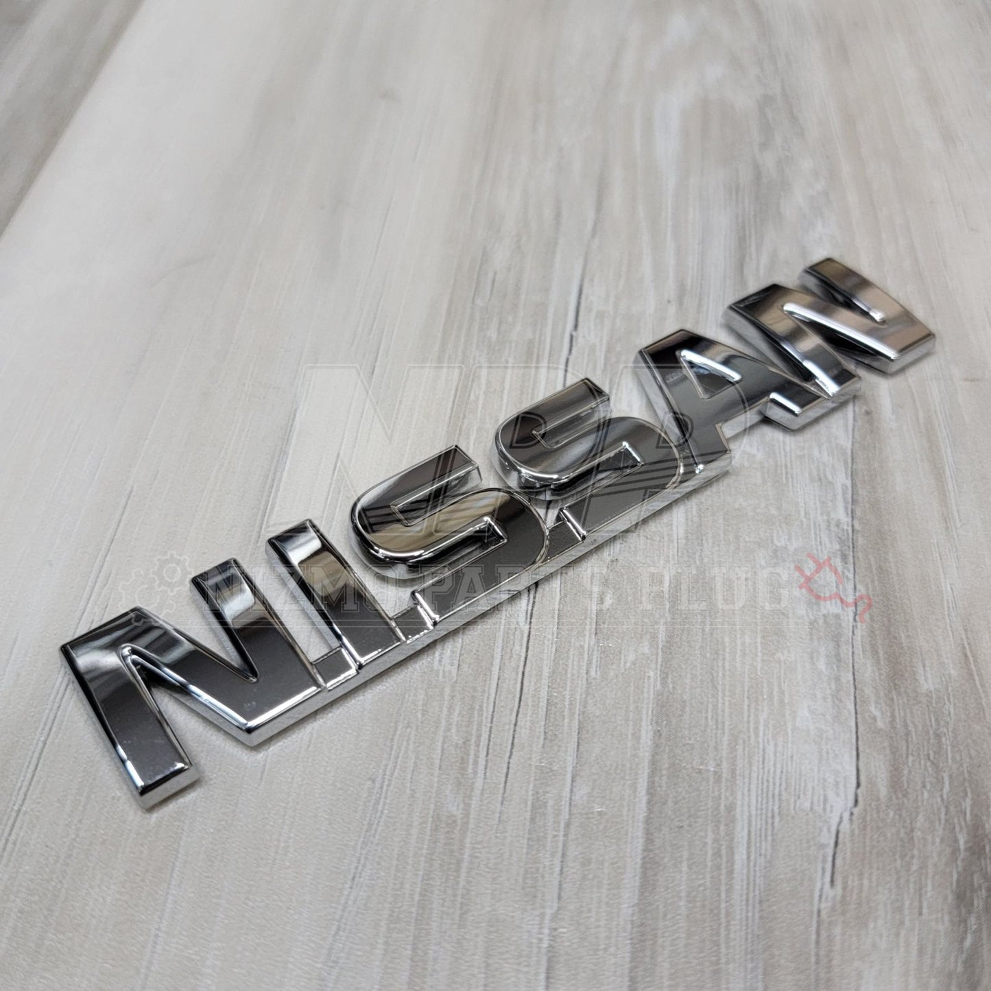 Nissan R32 Skyline "Nissan" Trunk Lid Emblem